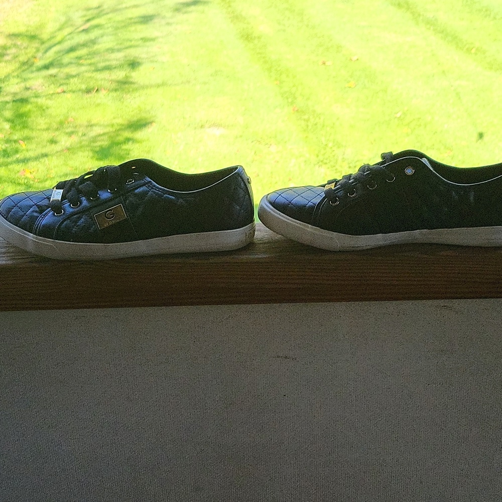 Lightly used Guess quilted black leather sneakers size 9